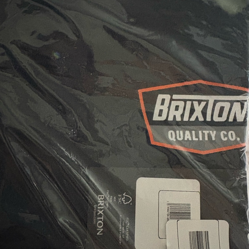 Brixton Black Tee with Orange Logo